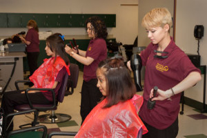 Cosmetology students at work