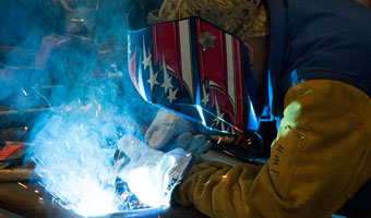 Adult student welding