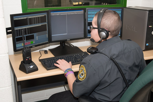 A PSS student practices her dispatching skills