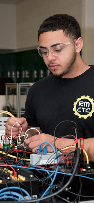 An Engineering and Automation Technology student at work.