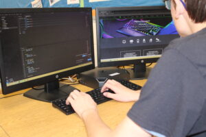 ITW student working on web design project